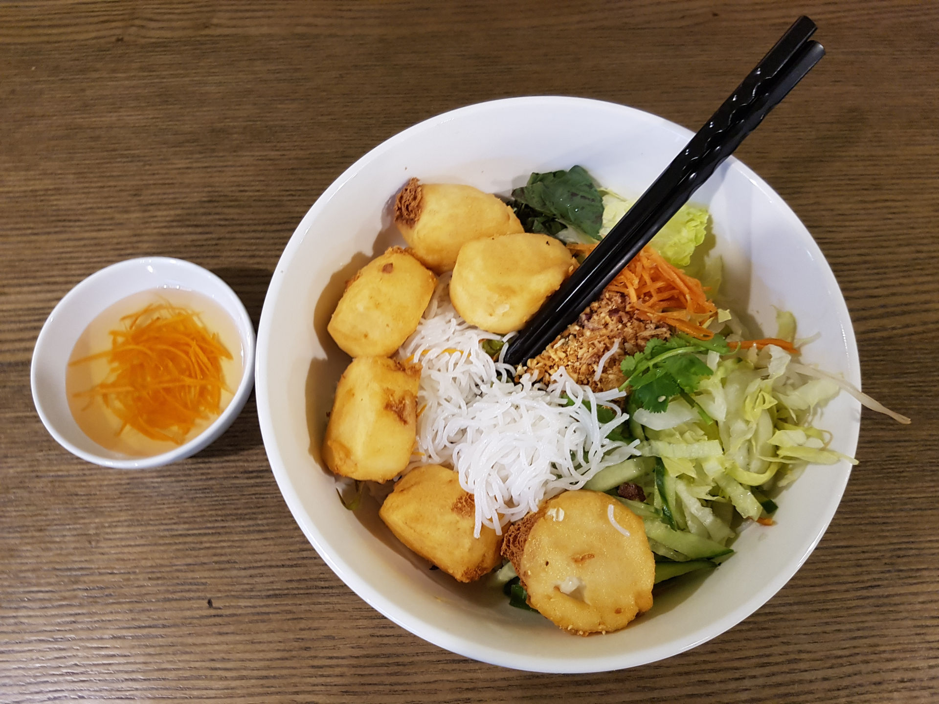 Rice Noodles with Fried Bean Curd and Vegetarian Spring Rolls.