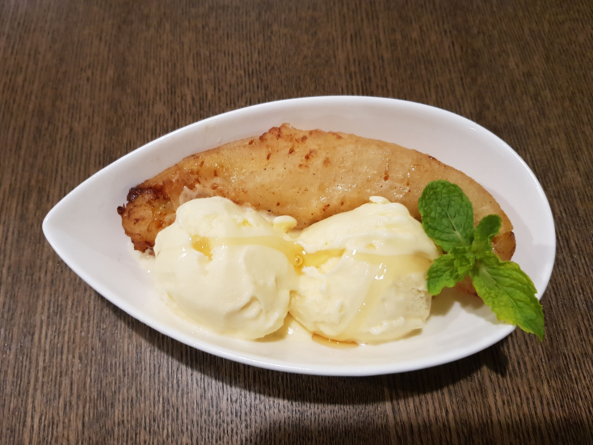 Fried banana with ice cream.