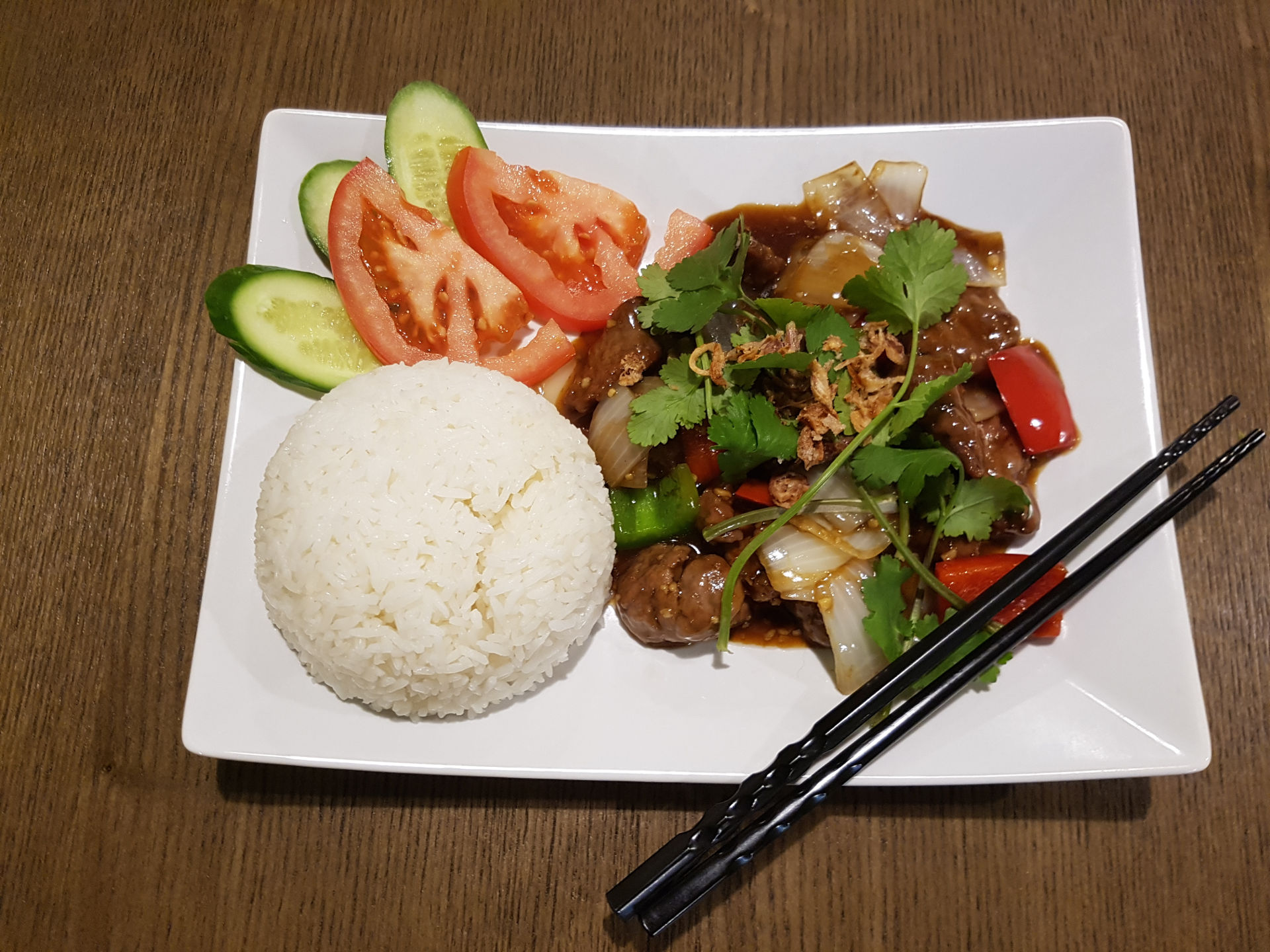 Wok Tossed Diced Beef In Butter Sauce.
