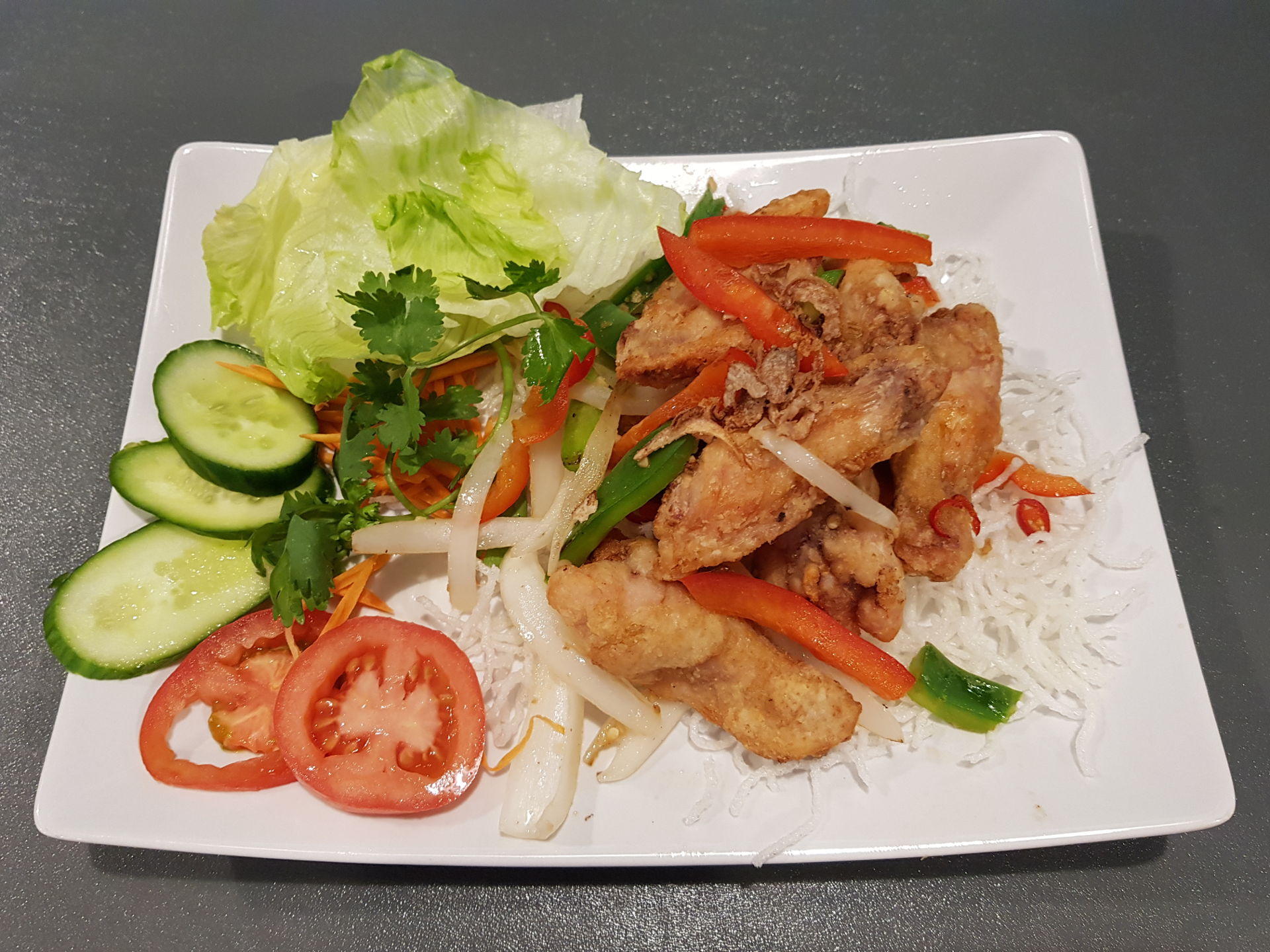 Salty, spiced chicken ribs.