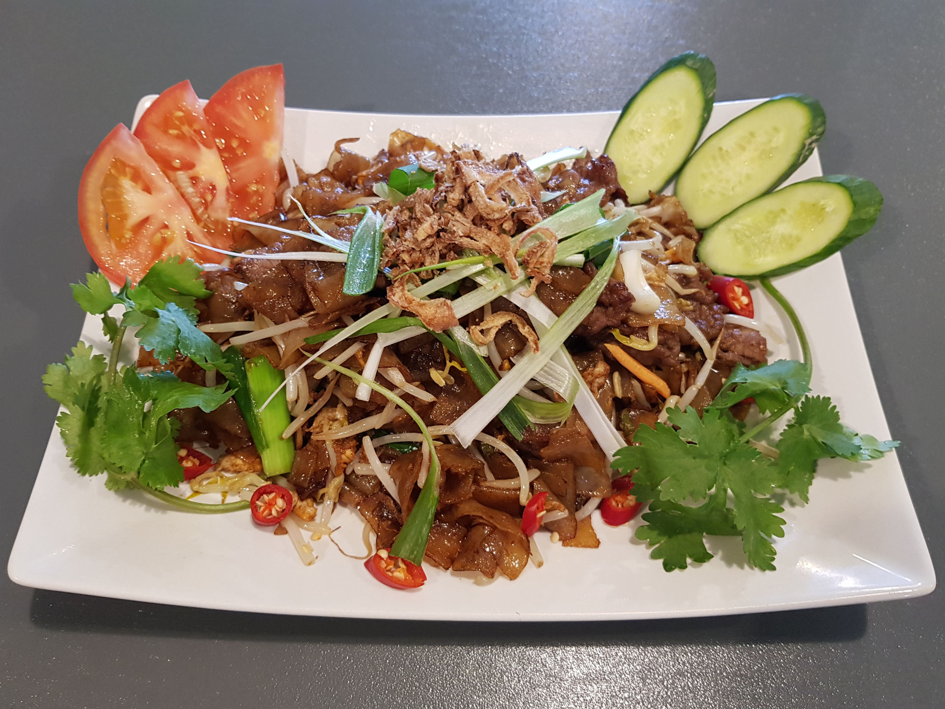 Stir fry beef and tapioca noodles.
