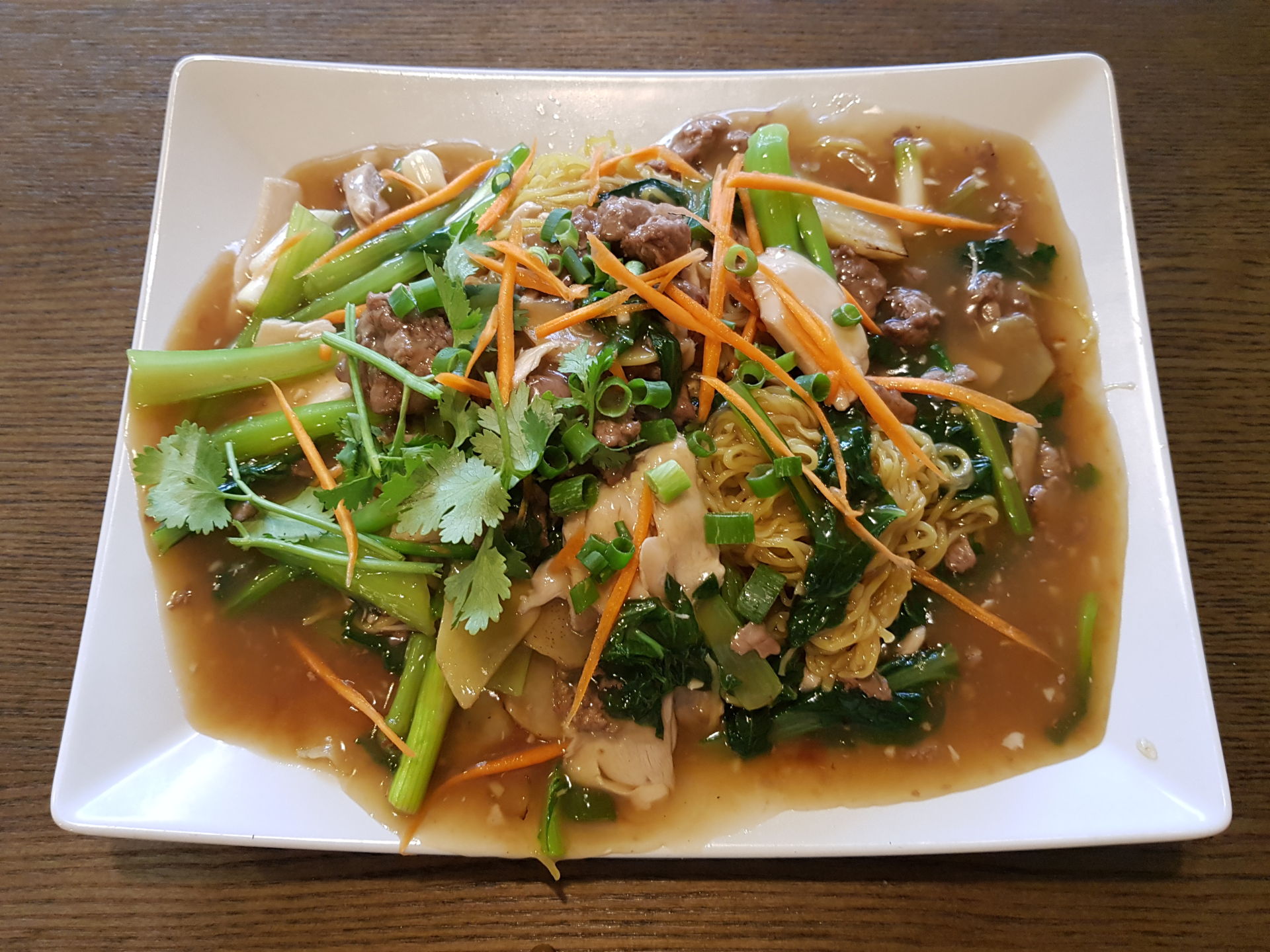 Stir Fry Chicken, Beef and Mushroom with Soft Egg Noodles.